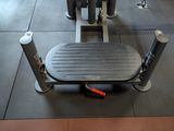 a machine that is sitting on the floor in the gym
