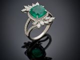 an emerald and diamond ring