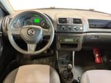 the interior of a car with a steering wheel, dashboard, and dashboard controls