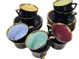 several cups and saucers are stacked on top of each other