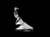 black and white photograph of a sculpture of a woman ' s torso