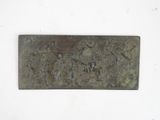 an image of a bronze plaque with a scene of a man and a woman