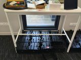 a table with a bunch of electronic equipment on it