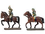 two figurines of men riding horses on a white background