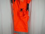 an orange safety vest hanging on a white curtain