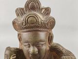 statue of a woman with a bird on her shoulder