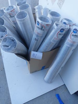many rolls of duct tape in a box on the ground