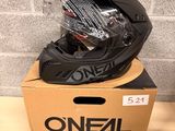 a helmet on top of a box on a table