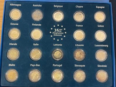 an image of a box of coins with the names of the countries