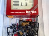 a box with a bunch of screws inside of it