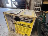 a box that is sitting on the floor next to a machine