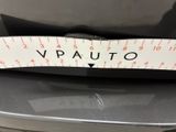 a measuring tape on the back of a car seat
