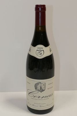a bottle of wine that is sitting on a table