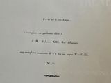 a close up of a book with a black and white image