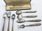 a silverware set in a case on a table