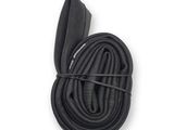 a close up of a pair of black shoes laces on a white background