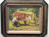 un tableau représentant deux vaches dans un champ, avec un homme agenouillé à côté d'elles