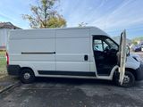 a white van parked on the side of the road