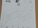 a drawing of a table with drawers and a trash can