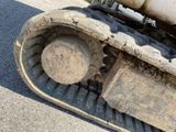 a close up of a tractor tire on the ground