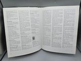a open book that is sitting on a table