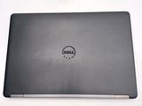 dell laptop computer with dell logo on the back of it