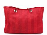 a red handbag on a white background