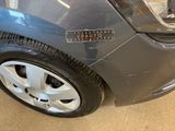 a close up of a car with a sticker on the side of it