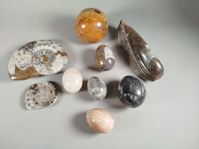 many different types of rocks and stones on the table