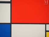 an image of a red, yellow, blue, and black painting on a wall