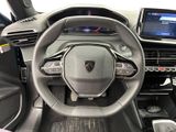 the interior of a car with a steering wheel and dashboard controls