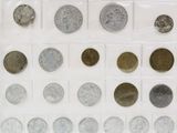 a lot of coins that are on the table
