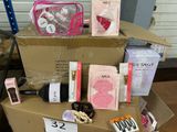 a lot of items that are sitting on top of a cardboard box