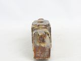 an image of a small piece of wood that has been carved into it