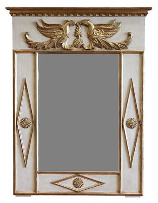 une image représentant un miroir sur lequel est posé un oiseau