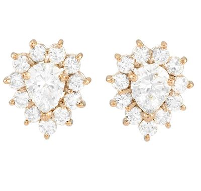 une paire de boucles d'oreilles en or blanc et en or jaune, serties de diamants