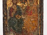an old wooden icon with a painting of jesus and mary on it