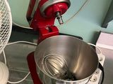 an image of a red mixer and a silver bowl