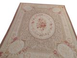 beige area rug with pink flowers and parasols on a white background