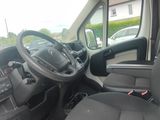 a picture of the inside of a truck with the driver ' s seat down