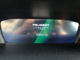 a picture of a close up of a car ' s rear view mirror