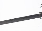 a black sword that is laying on a white surface