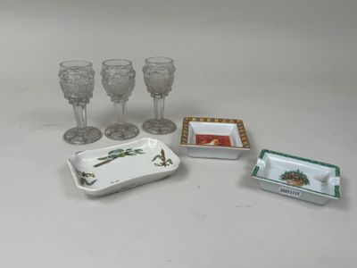 four wine glasses, a tray, and a tray with wine glasses on it
