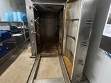 a large open door in the middle of a room