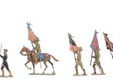 plusieurs figurines de soldats tenant des drapeaux américains, posées sur une surface blanche