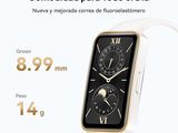 an image of a smart watch with a white band and gold numbers