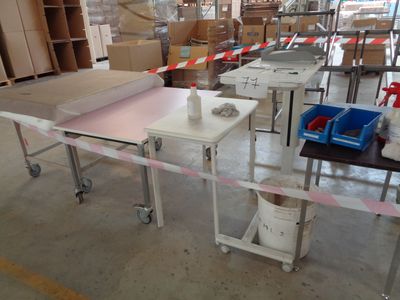 a table that has a bunch of boxes on it