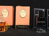 many different types of perfumes on the table
