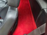 a seat belt that is attached to the back of a car