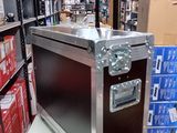 a metal case sitting on top of a table in a store